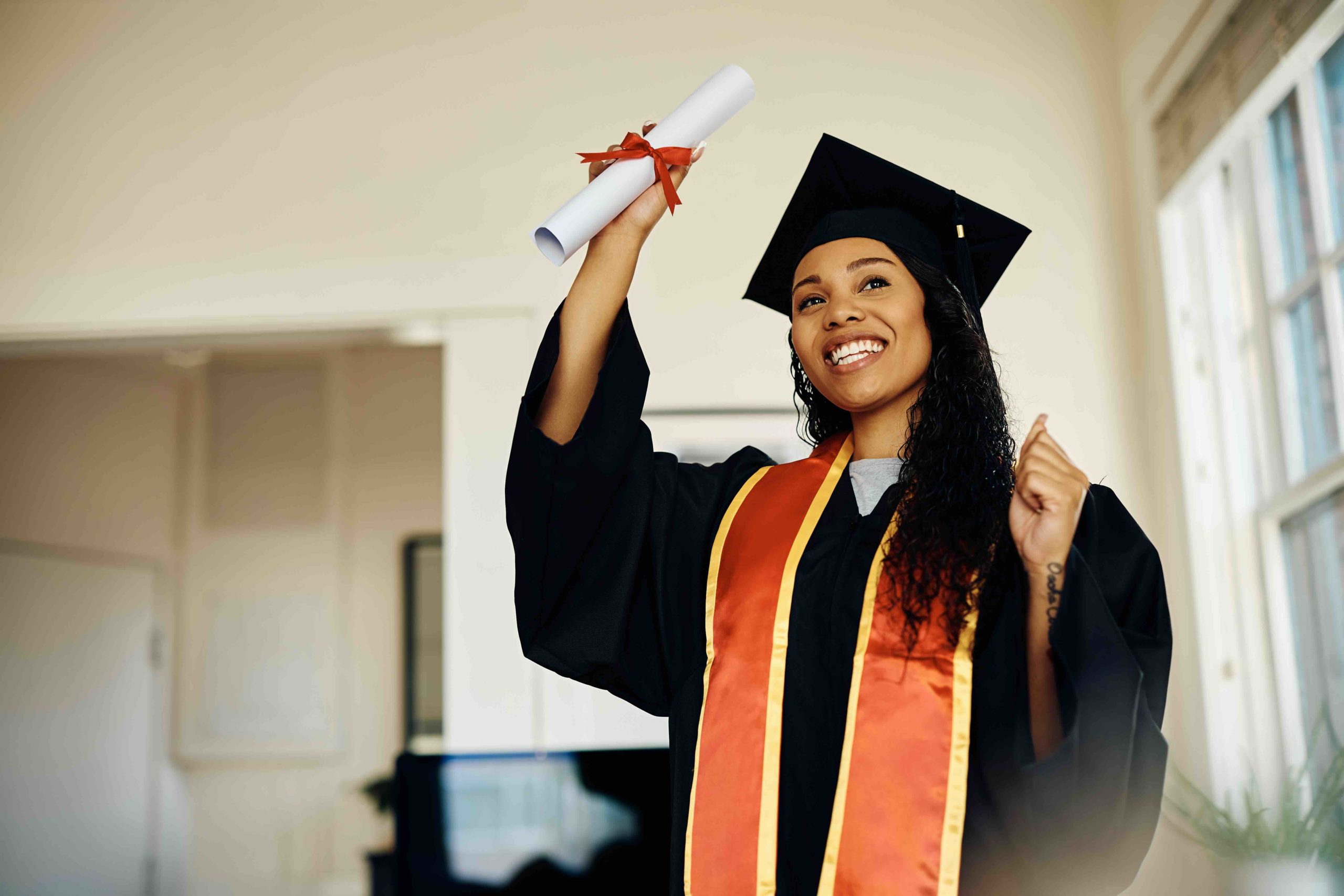 student happy to have achieved her BSc