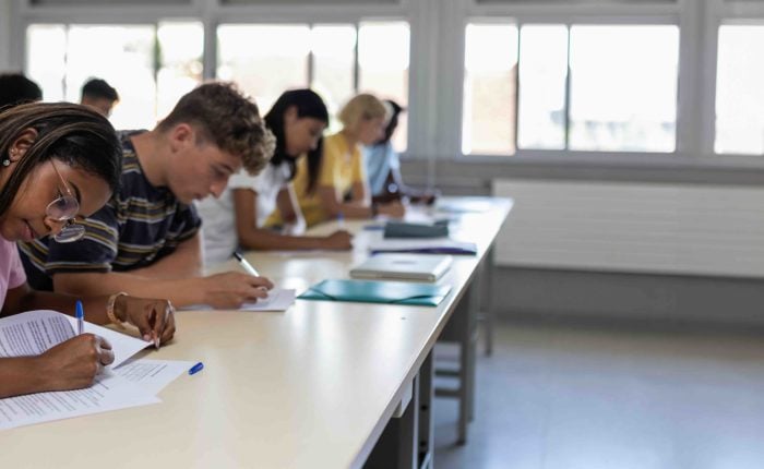 University students submitting an evaluation for a university in Switzerland